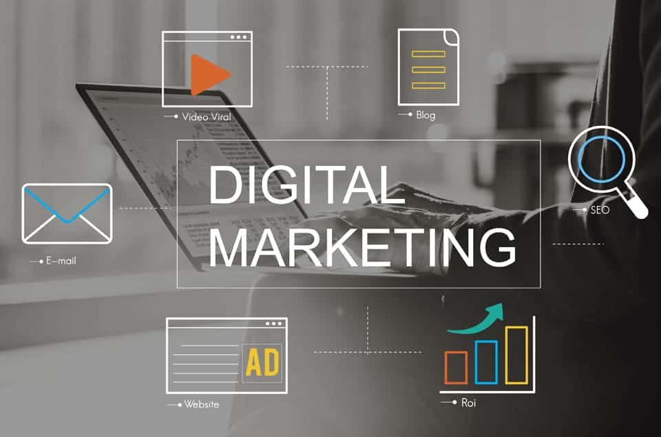 laptop with digital marketing across it